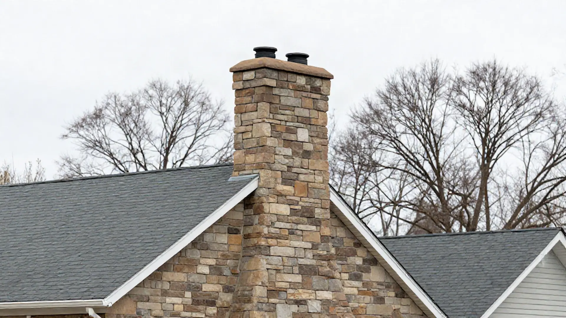 Brick chimney on a home served by Aspen Run Chimney Care in Philadelphia, PA